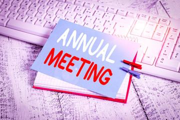 Writing note showing Annual Meeting. Business concept for yearly meeting of the general membership...