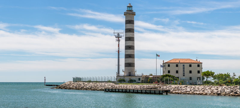 Lido di Jesolo - Veneto, Italy: Adriatic Sea, the lighthouse on the beach at the mouth of the river Sile, Faro di Piave Vecchia