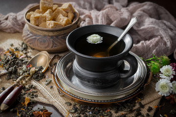 Tea in a cup on an old background
