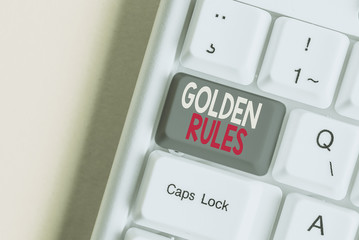 Word writing text Golden Rules. Business photo showcasing basic principle that should always follow to ensure success White pc keyboard with empty note paper above white background key copy space