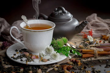 Tea in a cup on an old background