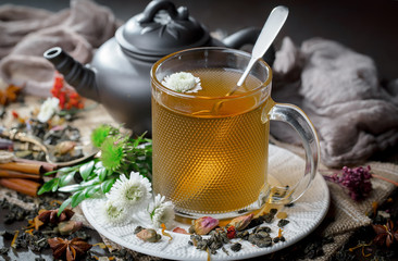 Tea hot drink on old background in composition on the table