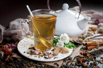 Tea hot drink on old background in composition on the table