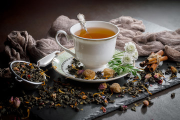 Tea in a cup on an old background