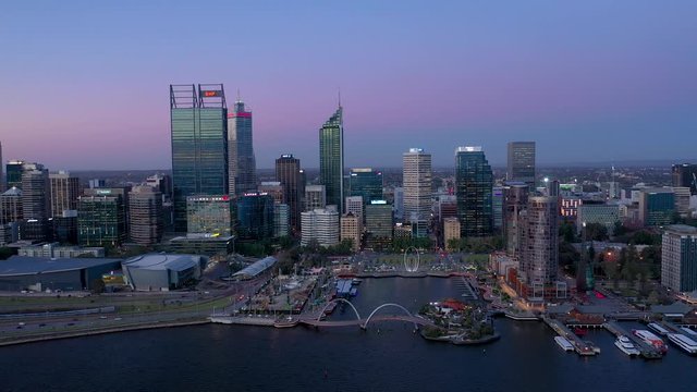 Smooth 4K drone footage of Perth Australia CBD at dusk