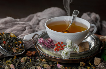 Tea in a cup on an old background