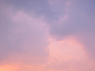 Pink clouds in the evening sky as a background.