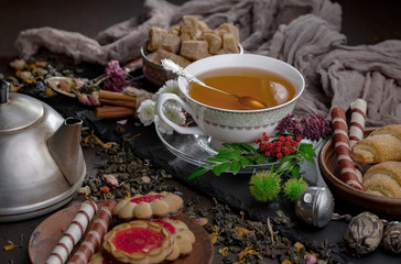 Tea in a cup on an old background