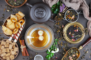 Tea hot drink on old background in composition on the table