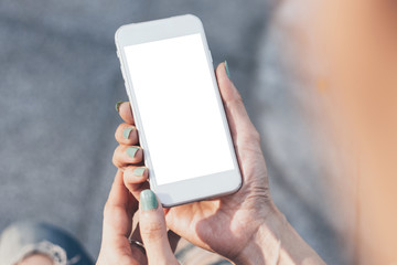 Mockup image blank white screen cell phone.man hand holding texting using mobile on desk at coffee shop.background empty space for advertise text.people contact marketing business,technology 