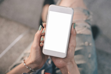 Mockup image blank white screen cell phone.man hand holding texting using mobile on desk at coffee shop.background empty space for advertise text.people contact marketing business,technology 