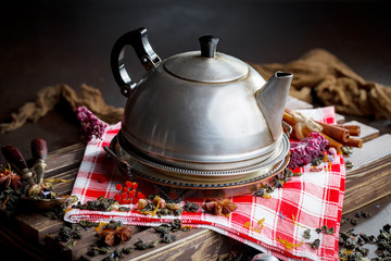 Tea hot drink on old background in composition on the table