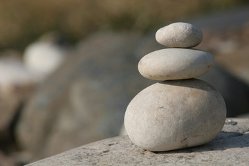 Fototapeta na wymiar Pyramid of three stones for meditation.