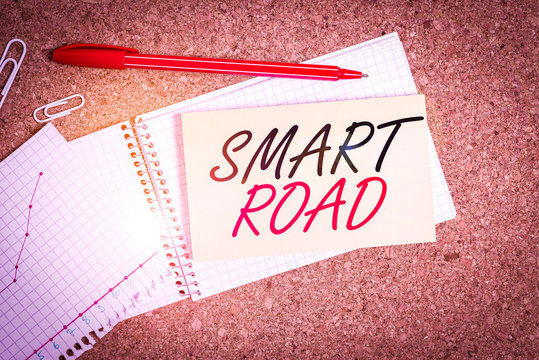 Handwriting text Smart Road. Conceptual photo number of different ways technologies are incorporated into roads Desk notebook paper office cardboard paperboard study supplies table chart