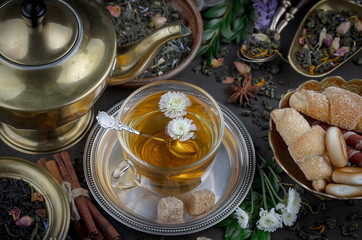 Tea in a cup on an old background