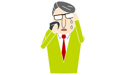 眼鏡をかけた男性　涙を拭く