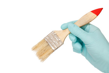 Woman holding painter brush on a white isolated background. Repair tool.