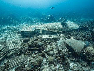 Elvin's Plane Wreck in coral reef of Caribbean sea around Curacao