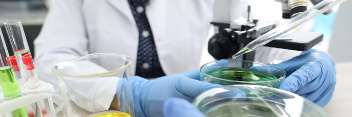 Biochemist and assistant in lab