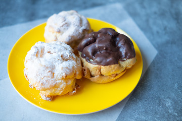 Set of cream pastry puffs