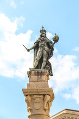 Fototapeta na wymiar Trieste, Italy. Leopoldo I D'Asburgo statue in front of Chamber of commerce (Camera di Commercio, Industria, Artigianato e Agricoltura Venezia Giulia).