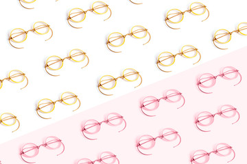 Pattern of golden and pink old fashion glasses