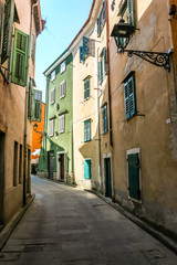 Fototapeta na wymiar Muggia, Italy. Beautiful streets of Muggia in sunny day.