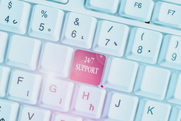 Text sign showing 24 Or 7 Support. Business photo text Giving assistance to service whole day and night No downtime White pc keyboard with empty note paper above white background key copy space