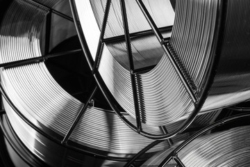 welding wire, stainless steel, on a black background