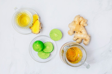 Cup of tea with fresh lemon and ginger - Top view