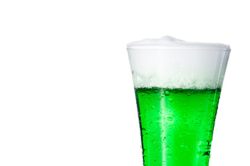 Traditional St Patrick's Day green beer isolated on white background. Copy space