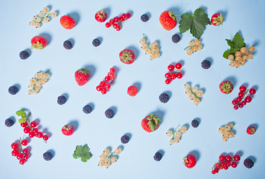 Colorful pattern made of fruits, leaves and berries