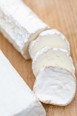Fresh cheese on Wooden board.  Cheese platter