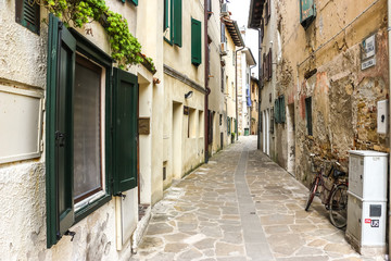 Fototapeta na wymiar Grado, Italy. Beautiful streets of Grado in sunny day.