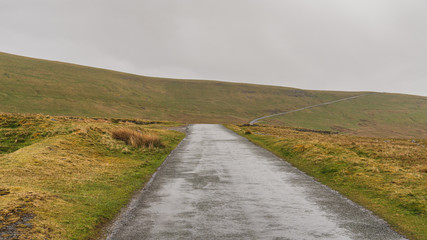 Fototapeta premium A rainy day on the B6270 road between Birkdale and Nateby, Cumbria, England, UK