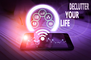 Text sign showing Declutter Your Life. Business photo text To eliminate extraneous things or information in life Picture photo system network scheme modern technology smart device