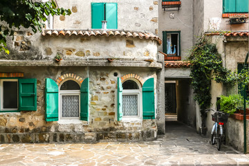 Grado, Italy. Beautiful streets of Grado in sunny day. - obrazy, fototapety, plakaty