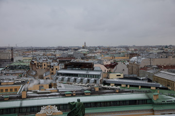 Beautiful view of St. Petersburg from the observation deck of St. Isaac's Cathedral on a blue cloudy day.