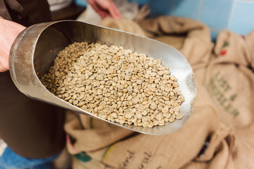 Coffee trader showing the raw product