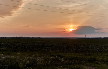 Power Lines and Oil Rig at Sunset
