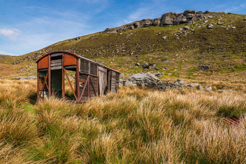 A derelict site trailer near the B6270 road between Nateby and Birkdale, North Yorkshire, England, UK