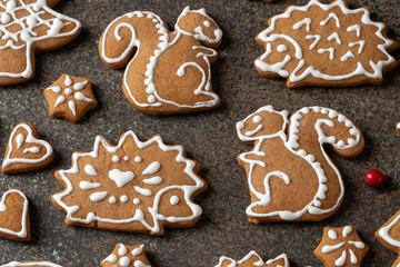 Obraz na płótnie Canvas Christmas gingerbread cookies in the form of squirrels and hedgehogs
