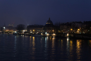 Czech Republic, Prague. Night on the river in historical part of city.