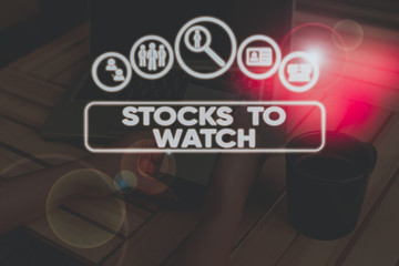 Conceptual hand writing showing Stocks To Watch. Concept meaning being heavy broker and watch every...