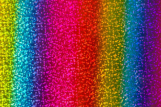 Seamless abstract glitter rainbow background of holographic paper