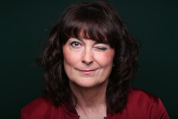 Beautiful woman in front of a background