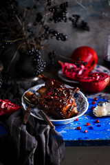 quail in pomegranate sauce. rustic photo