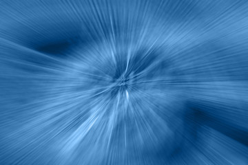 Circular geometric classic blue blurred gradient background. Abstract explosion effect. Centric motion pattern. Mixed texture. Color burst