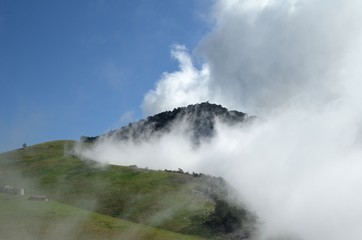 mountain in the clouds in Italy