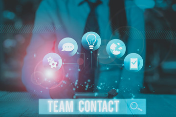 Conceptual hand writing showing Team Contact. Concept meaning The interaction of the individuals on...